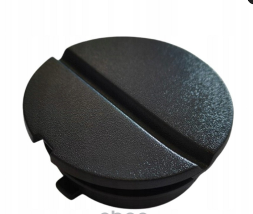 Заглушка бампера TGS (круглая верхняя справа)