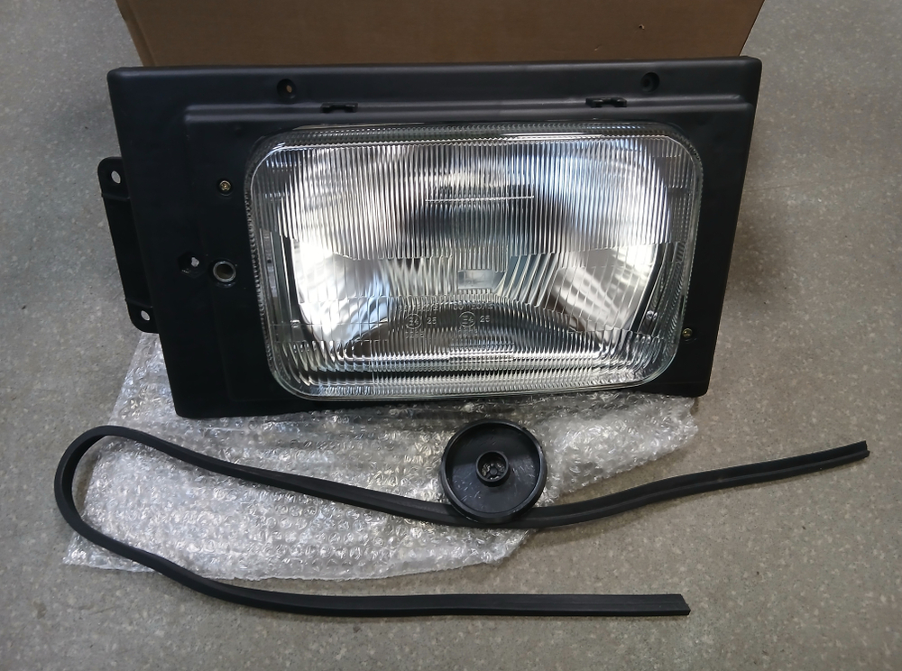 Фара левая Scania 82/92/93/112/113/142/143